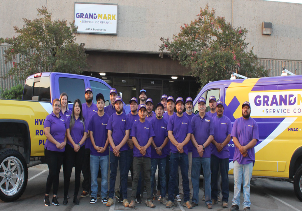 Grandmark Service Company team and fleet vehicles